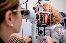 Visual Disabilities Rehabilitation. In this image an ophthalmologist is examining a patient. 